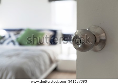 half opened bedroom door with door knob