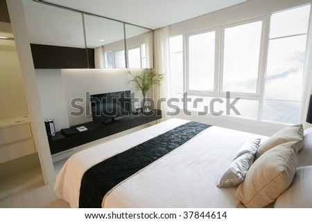 panorama view of condominium bedroom looking through the window