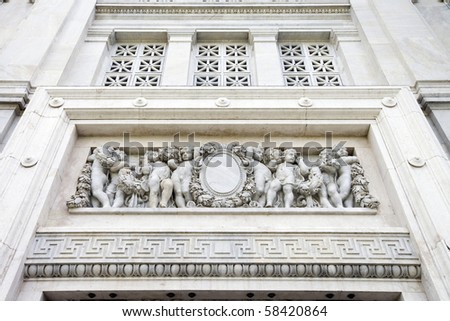 the bas-relief on the wall of italian neo classical building