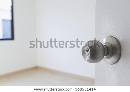 half opened room door with door knob