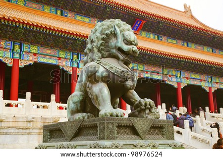 A traditional Imperial guardian lion at the Gate of Supreme Harmony in Forbidden City. Beijing, China.