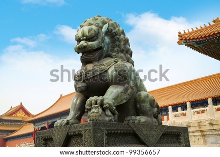 A traditional Imperial guardian lion at the Gate of Supreme Harmony in Forbidden City. Beijing, China.