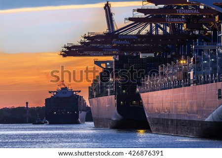 Container Port of Hamburg in the light of the setting sun; Northern Germany
