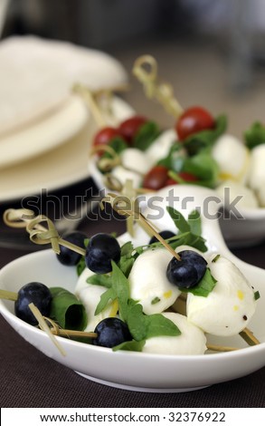 Herb-Marinated Mozzarella Ball and blueberry,