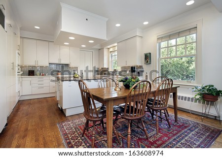 Kitchen In Suburban Home With Eating Area