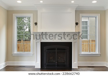 Family room in new construction home with fireplace
