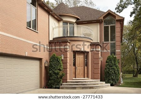 Front door and garage of luxury home
