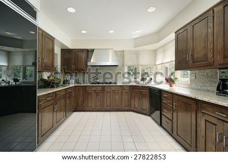 Square wood paneled kitchen