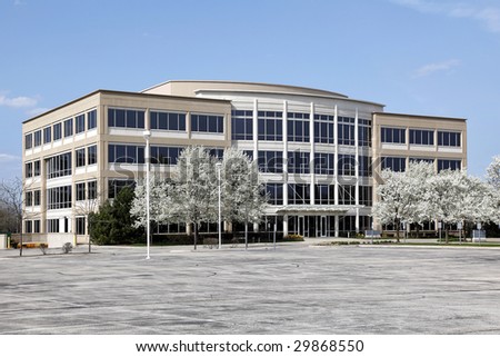 Office building with blooming trees in spring