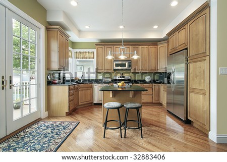 Kitchen in suburban home with small island