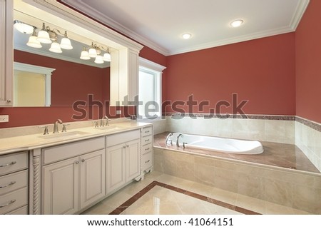 Master bath with salmon-colored walls