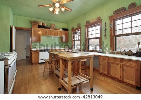 Traditional kitchen with green walls