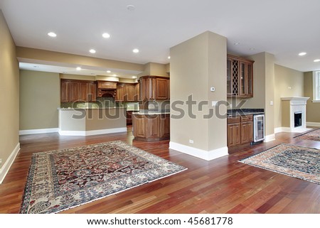 Family room in new construction home with cherry wood floors