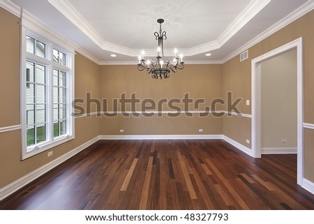 Dining room in new construction home with tan walls