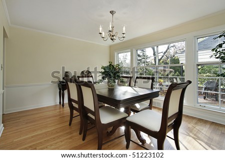 Dining room in remodeled home with patio view