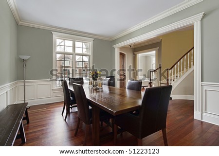 Dining room in luxury home with foyer view