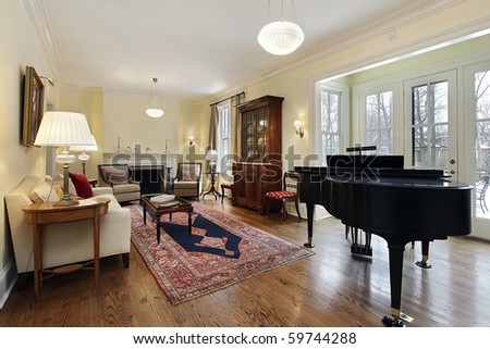 Living room in luxury home with large piano