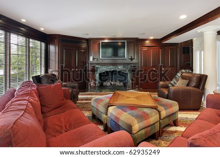 Family room in luxury home with cherry wood cabinetry