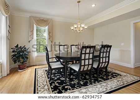 Dining room in suburban home with black table