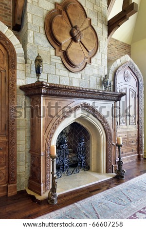 Large fireplace in family room with stone chimney