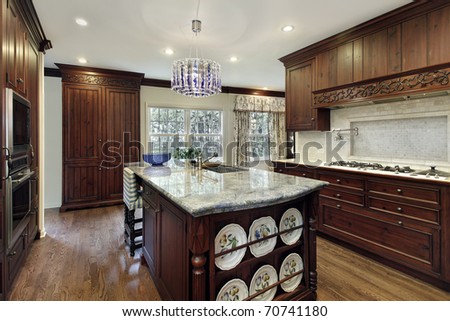 Kitchen Islands Wood on Traditional Kitchen With Dark Wood Cabinetry And Granite Island Stock