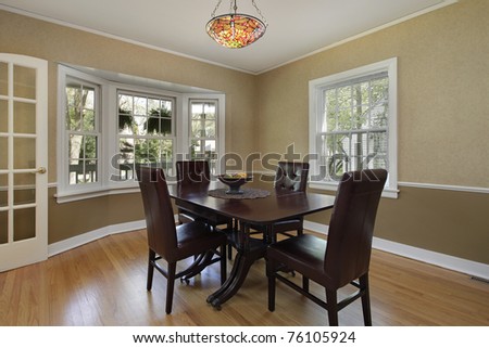 Dining room in suburban home with french doors