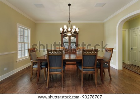 Dining room with buffet and gold walls