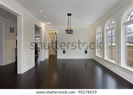 Dining room in new construction home with curved windows