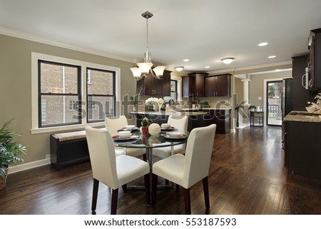 Kitchen in suburban home with large eating area.