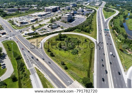 Aerial view of highways, surface streets, shopping centers and strip malls in the Chicago suburb of Northbrook, IL. USA