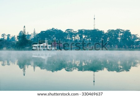 Xuan Huong lake in Dalat city, Lam Dong province, Vietnam. This artificial lake in the city centre is a favourite place for tourists and locals for walking.