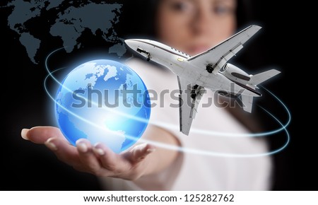 Girl with the planet Earth and the airliner.