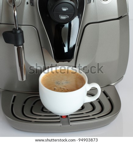 Coffee machine with a cup of coffee.