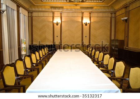 The big table under a white cloth and is a lot of chairs on Stalin\'s summer residence in Abkhazia