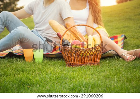 http://image.shutterstock.com/display_pic_with_logo/363082/291060206/stock-photo-young-couple-having-picnic-in-the-park-man-and-woman-came-with-basket-full-of-food-and-drinks-291060206.jpg