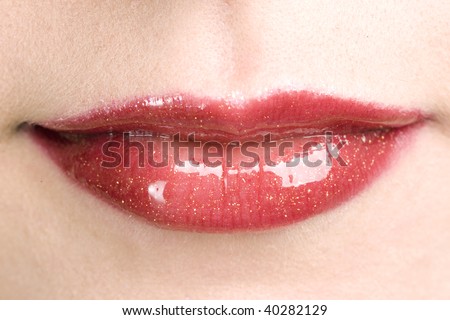 Shiny red woman\'s lips with make up