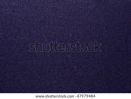 Close up of dark blue colored wool textile in Hi-Res