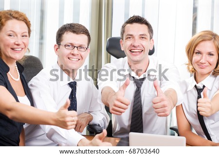 Business team express positivity on meeting in board room in Hi Res