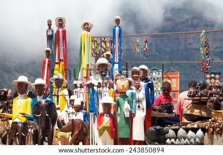 CAPE TOWN, SOUTH AFRICA, - 13 JANUARY 2015 : African carved art for sale at roadside stall.