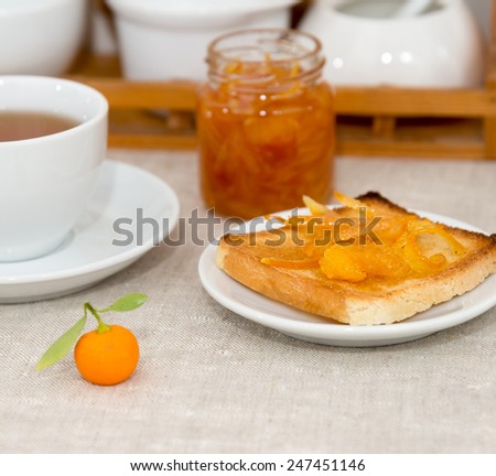 Breakfast of orange marmalade on toast