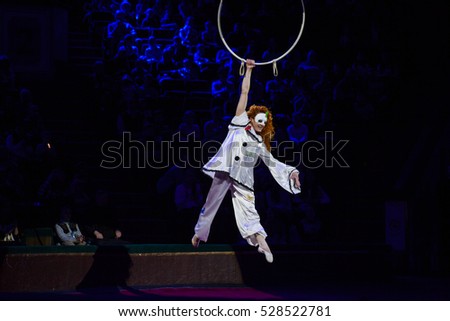 Clown. Circus. Aerial gymnast in the ring. Circus artist. Flying under the big top. The risk to life. Without insurance.