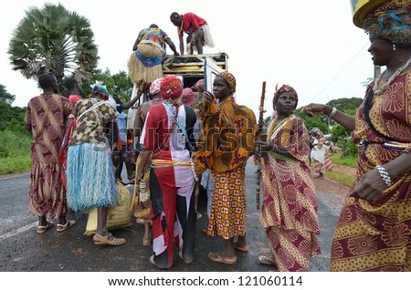 KARTIAK,SENEGAL-SEPT 18:people on the road go to a ritual of Boukoutt of Initiation ceremony on Sept 18,2012 in Kartiak, Senegal.The ceremony occurs every 30 years and celebrates boys becoming men.