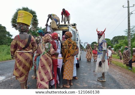 KARTIAK,SENEGAL-SEPT 18:people on the road go to a ritual of Boukoutt of Initiation ceremony on Sept 18,2012 in Kartiak, Senegal.The ceremony occurs every 30 years and celebrates boys becoming men