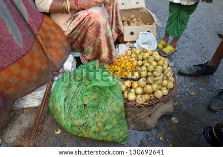NEW DELHI,INDIA-FEBRUARY 4 : a seller of vegetables in a market in New Delhi in February 4,2013. the food market in New Delhi is the largest one in India.