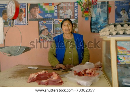 ORURO, BOLIVIA, CIRCA June 2006: Esther Morales in his little butcher shop circa June 2006. Esther is the sister of the President of Bolivia Evo Morales.Esther Morales leads a very modest life