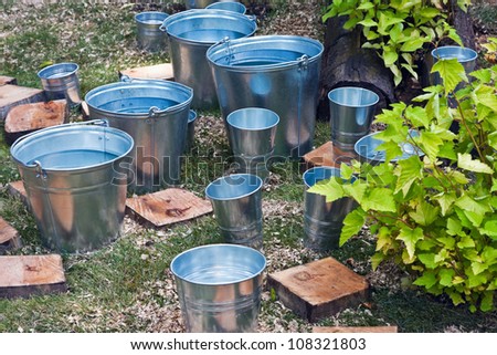 zinc bucket of water standing