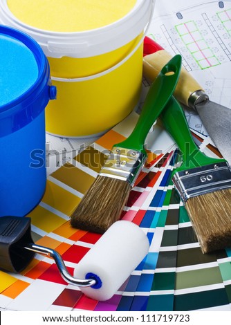 brushes, rollers of paint rooms on the architectural plan