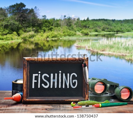fishing tackle and a blackboard