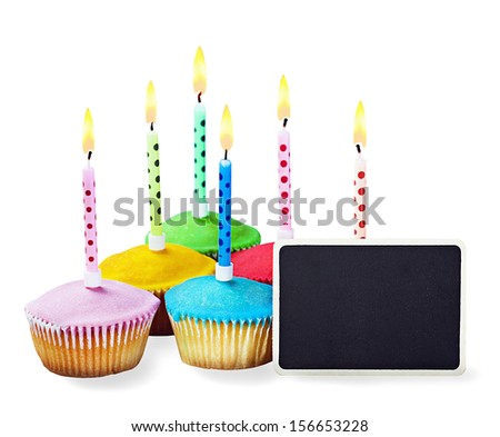 colorful happy birthday cupcakes with candles on white background
