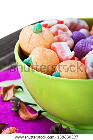 candy and pumpkin souffle of a holiday Halloween on a white background